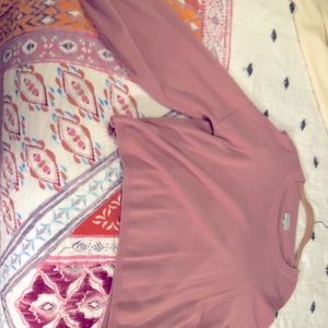 Pale pink cropped long sleeve top
